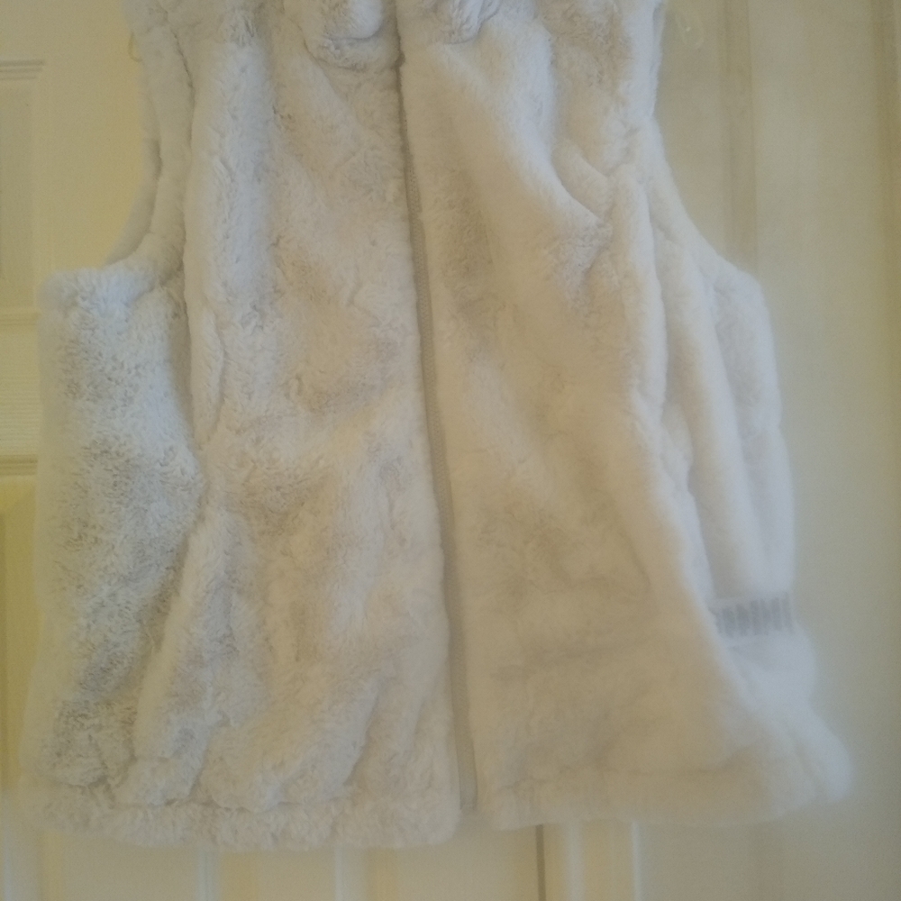 Nicole Milller Vest. Faux Fur reversible vest. Like new. No stains and no frays